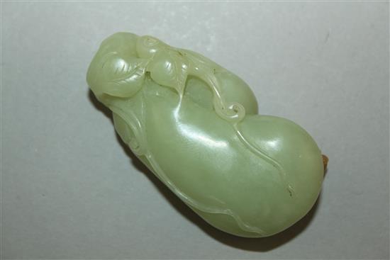 A Chinese yellow and russet jade carving of gourds, 19th/20th century, 5.5cm